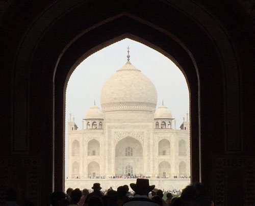 the Taj framed by the gardens entrance